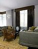 After:  Dining room shot on Central Park West - solar shades, contoured flat valance with kick pleats, ripplefold draperies and 